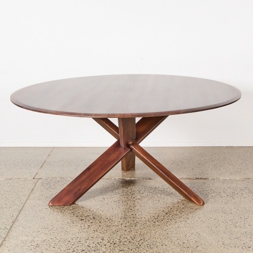A Large Solid Wood Circular Dining Table