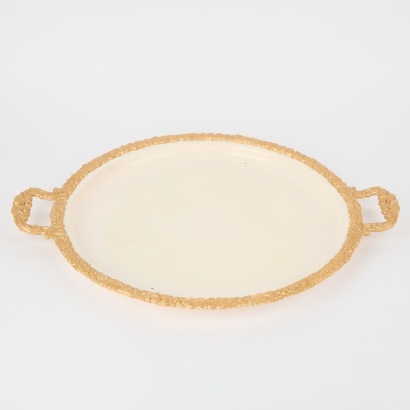 A Vintage Cast Metal Serving Tray With Gold Border