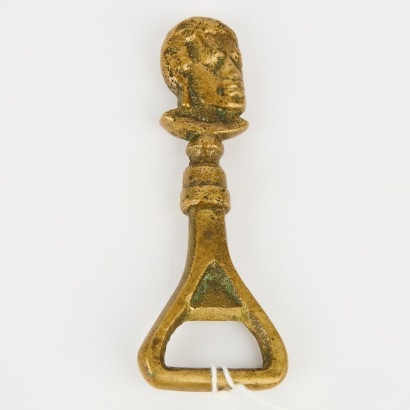 A Vintage New Zealand Maori Chief Brass Bottle Opener