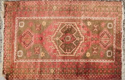 A Vintage Hand Knotted Woollen Rug
