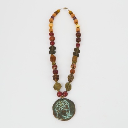A Glass and Stone Necklace with a Roman Figure Metal Pendant