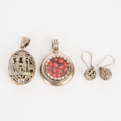 A Pair of Peruvian Silver Pendants and Earrings