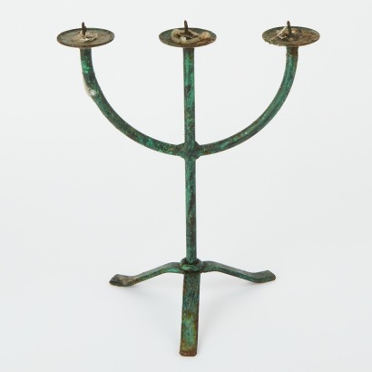 A Verdigris Candle Stick Holder