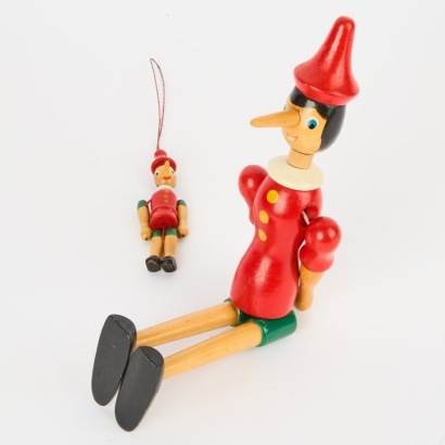 A Pair of Wooden Pinocchio Dolls