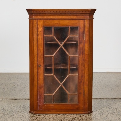 A Wall-Mounted Corner Cabinet