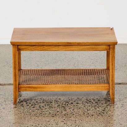 A Mid-Century Coffee Table With Rattan Magazine Rack