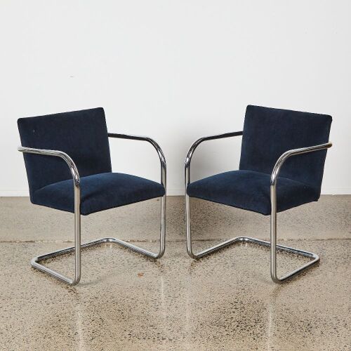 A Pair of MCM Chrome Bruno Style Chairs