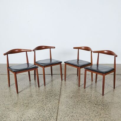 A Set Of Four Wood Look Aluminium Framed Wishbone Style Chairs