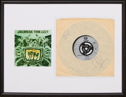 A Framed Signed Single by Thin Lizzy members Phil Lynott and Brian Robertson
