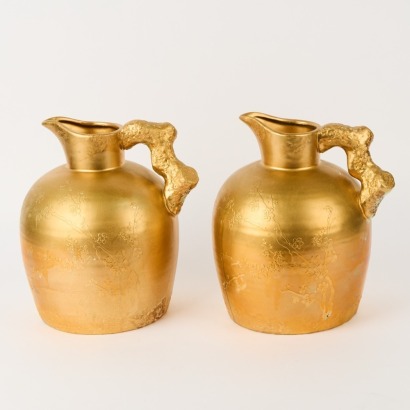 A Pair Of Decorative Gold Pottery Jugs