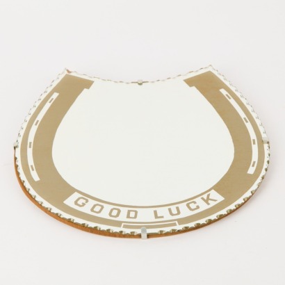 A Vintage Horseshoe Mirror