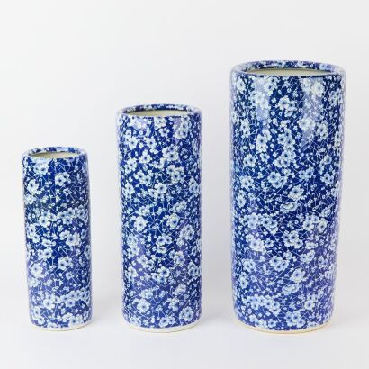 A Set Of Three Vintage Chinese Blue And White Graduating Vases
