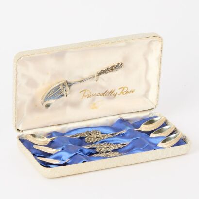 A Mid-Century Sterling Silver Piccadilly Rose 7-Piece Spoon Set