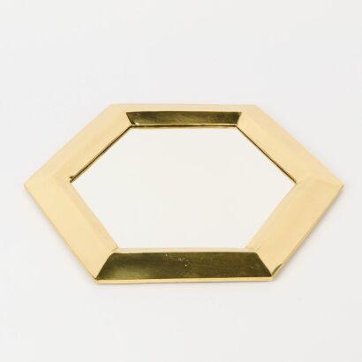 A Hexagonal Brass Mirror
