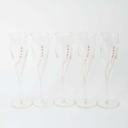 A Set of Four 1 Mumm Champagne Glasses