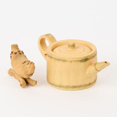A Chinese Yixing Teapot and a Bamboo Shoot-Shaped Ornament