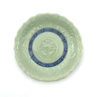 A Chinese Mid Qing Dynasty Celadon Glazed Blue and White Barbed 'Longevity' Saucer