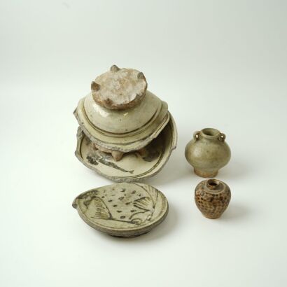 A Thailand 14th-16th Century Sukothai period Blue and White &lsquo;Fish&rsquo; Ceramic Round Fragment AND A Blue and White Bowl Fragment AND A Celadon-glazed Stoneware Pale Olive Small Jar AND A Small Sukothai Brown Spotted Jar