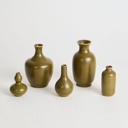 A Group of Five Chinese Tea-dust Glazed Bottles