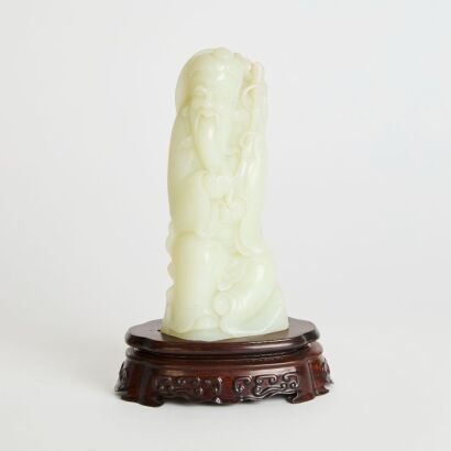 A Chinese White Jade Carving of a Fisherman (with Original Hardwood Stand)