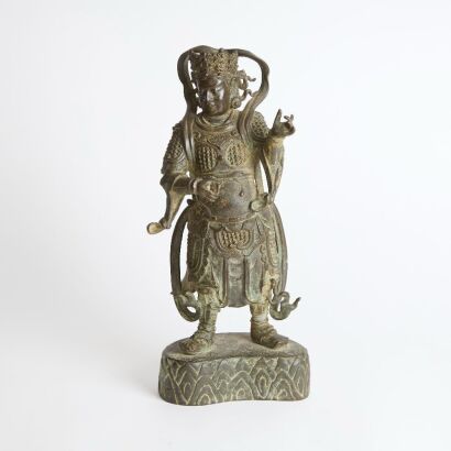 A Chinese Ming Dynasty Bronze Guardian Figure