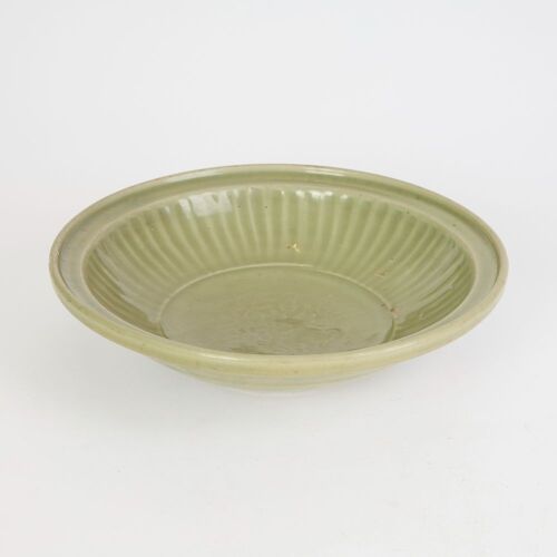 A Chinese Late Yuan to Early Ming Dynasty Longquan Celadon-glazed Fluted-rim Charger