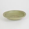A Chinese Late Yuan to Early Ming Dynasty Longquan Celadon-glazed Fluted-rim Charger