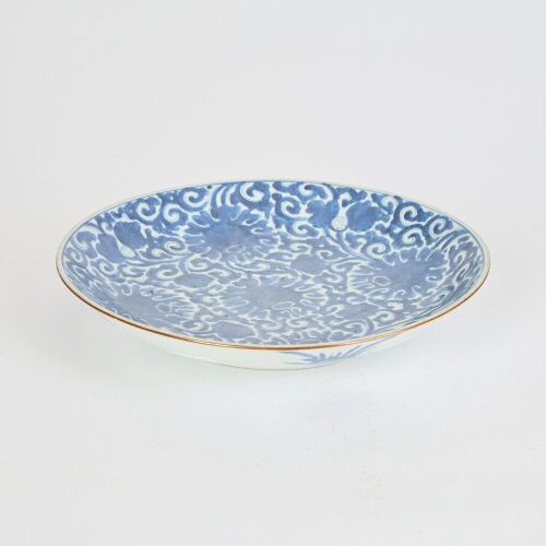 A Chinese Qing Dynasty Kangxi Blue and White 'Floral' Charger (Huajia Mark)