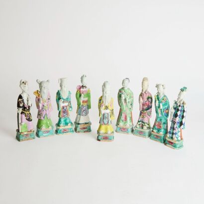 A Group of Nine Chinese 19th Century Qing Dynasty Famille-rose Figurines