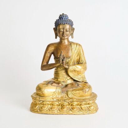 A Chinese Tibetan Late Ming to Early Qing Dynasty Gilt-Bronze Vairocana Buddha