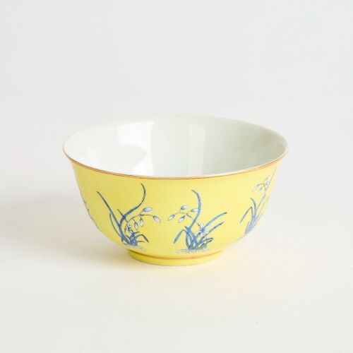 A Chinese Yellow-ground Blue-enamelled 'Floral' Bowl (Tongzhi Nian Zhi Mark)