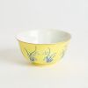 A Chinese Yellow-ground Blue-enamelled 'Floral' Bowl (Tongzhi Nian Zhi Mark)