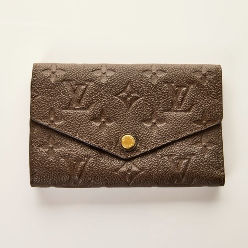 Louis Vuitton, Terre Monogram Empreinte Leather Curieuse Wallet with Box