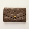 Louis Vuitton, Terre Monogram Empreinte Leather Curieuse Wallet with Box