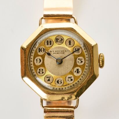 9ct Yellow Gold, 26mm Swiss Ladies Wristwatch, retailed by "G &T young, Dunedin" on 9ct Bangle