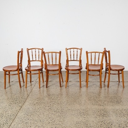 A Set of Six Bistro Chairs