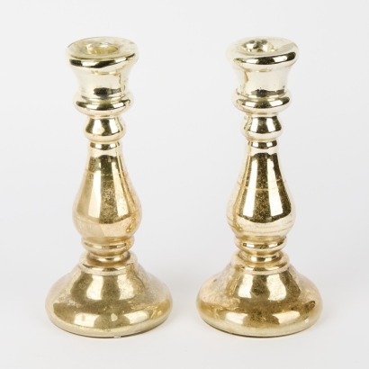 A Pair of Mirrored Glass Candlestick Holders