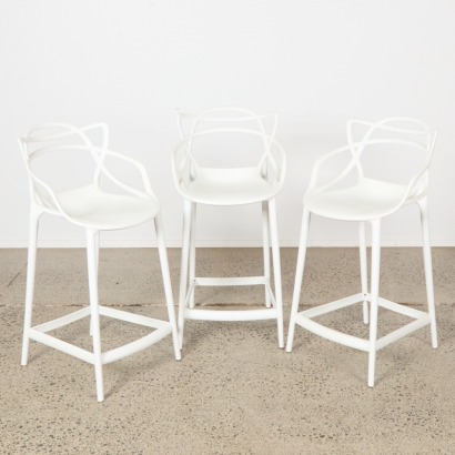 A Set of Three Contemporary Stools