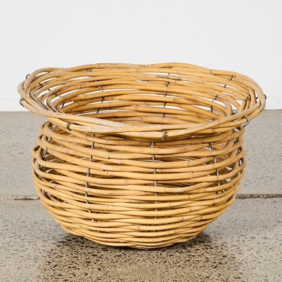 A Large Sculptural Woven Cane Log Basket