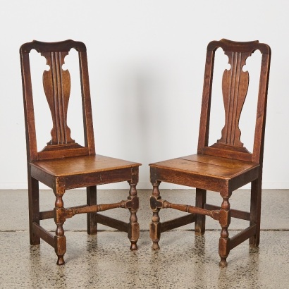 A Pair of Wood High Back Chairs