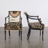 A Pair of Regency Style Elbow Chairs