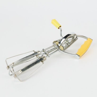 A Vintage Egg Beater with Yellow Handle
