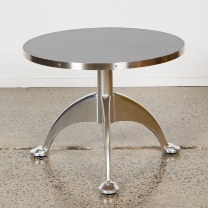 An Aluminium and Stainless Steel Tripod Occasional Table