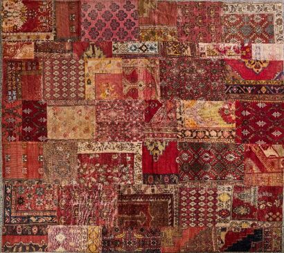 A Large Patch Work Persian Rug