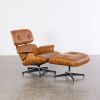 An Eames Lounge Chair And Ottoman By Herman Miller