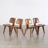 A Set of Four Early Walnut Eames DCW Chairs for Herman Miller