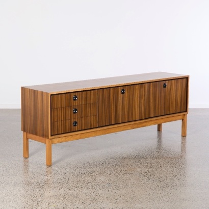 A Vintage Sideboard With Black Handles
