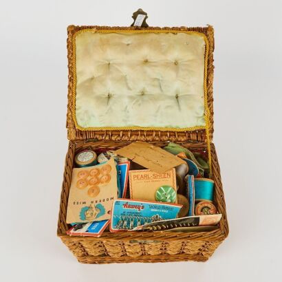A Vintage Sewing Basket with Vintage Buttons, Clasps, Needles and Threads