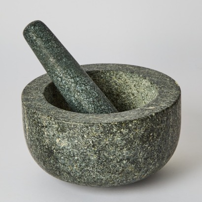 A Large Heavy Granite Mortar And Pestle