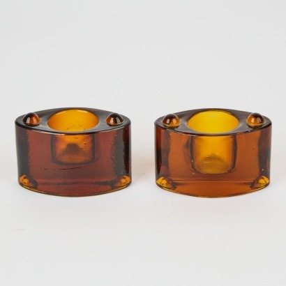 A Pair of Brown Glass Candle Holders